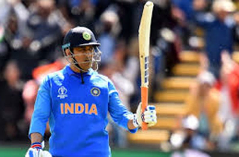Mahendra Singh Dhoni reaches his century off 77 balls.
