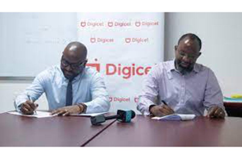 Permanent Secretary at the Ministry of Health, Malcolm Watkins and Digicel Guyana CEO, Gregory Dean