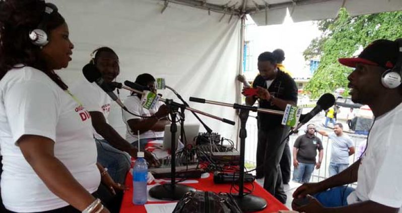 Radio show ‘Digicel Morning Vibez’ featuring DJ Casual, Big Red and Selector Face, and The Dread live yesterday outside Muneshwer’s on Water Street