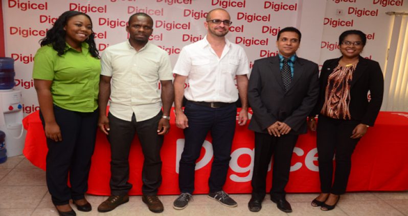 (L-R) GCF president Horrace Burrowes, Team Evolution/Gillette president Keith Fernandes, Cancer Institute's Ravindranauth Ichlanggod and Digicel PRO Vidya Sanichara.
