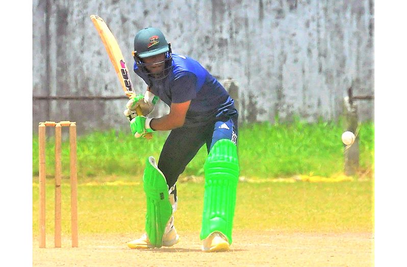 Mavindra Dindyal drives during his 82 for Demerara at Everest yesterday (Sean Devers photo)