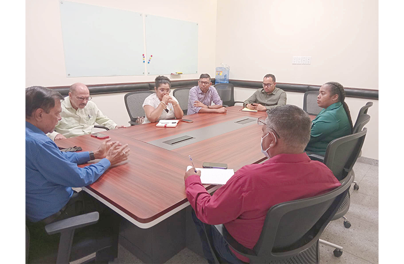 Director General Director General of the Ministry of Health, Dr. Vishwa Mahadeo (at the head table) and his team meeting with officials at the De Kinderen Hospital