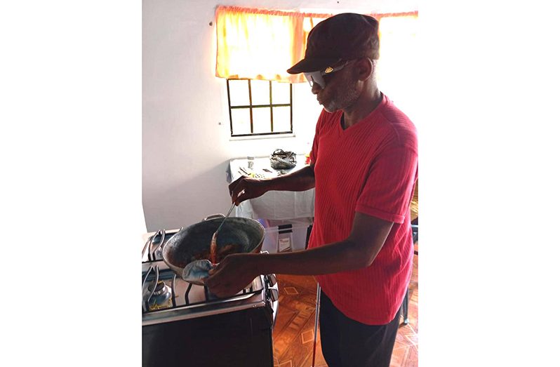 Mr. Felix Webster from North Ruimveldt, Georgetown, learned to navigate his stove and prepare a meal