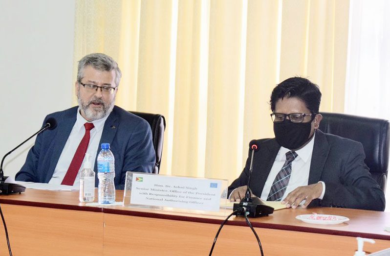 Senior Minister in the Office of the President with Responsibility for Finance, Dr. Ashni Singh and European Union (EU) Ambassador to Guyana, Dr. Fernando Ponz Cantó during the discussion at the Arthur Chung Convention Centre