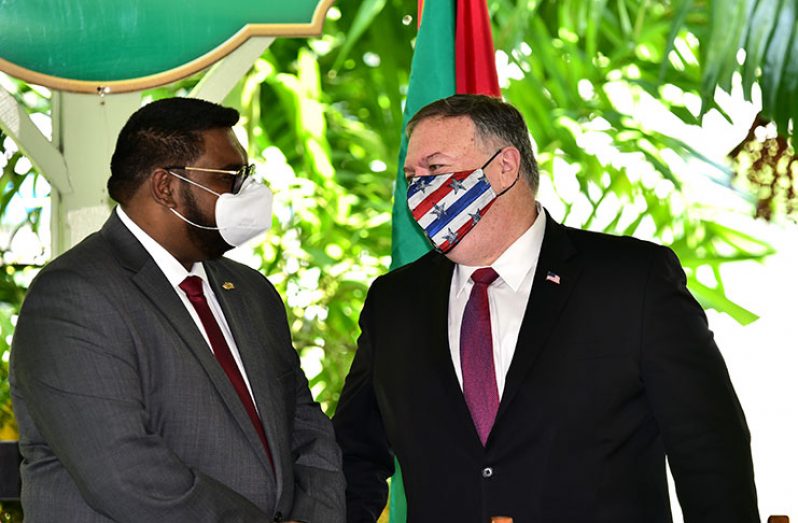 President Irfaan Ali and US Secretary of State, Michael Pompeo, sharing a light moment (Adrian Narine photo)