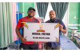 Proprietor of The New Doctor’s Clinic, Satyendra Khemra (right), officially sealed the agreement by handing over the sponsorship to key organiser and lead statistician Ronaldo McGarrell of FL Sport
