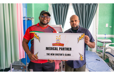 Proprietor of The New Doctor’s Clinic, Satyendra Khemra (right), officially sealed the agreement by handing over the sponsorship to key organiser and lead statistician Ronaldo McGarrell of FL Sport