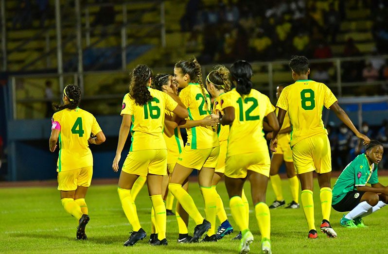 The Lady Jags celebrating during their 4-0 win over Dominica at the National Track and Field Centre in the CONCACAF Women’s Championship Qualifiers.