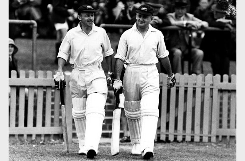 Don Bradman and Stan McCabe walk out to bat during Australia's 1938 tour of England  Fox Photos/ Getty Images