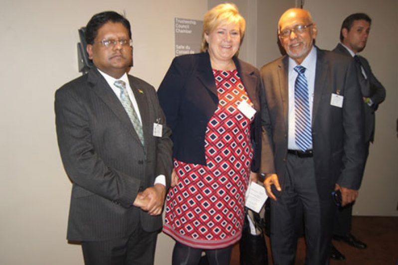 New Norwegian Prime Minister, Erna Solberg, is flanked by Finance Minister Dr Ashni Singh and President Donald Ramotar when they met on the sidelines of the UN General Assembly yesterday.