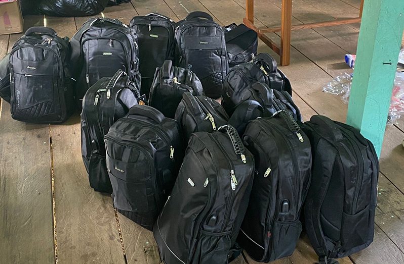 Backpacks with stationery supplies for the survivors of Chenapou