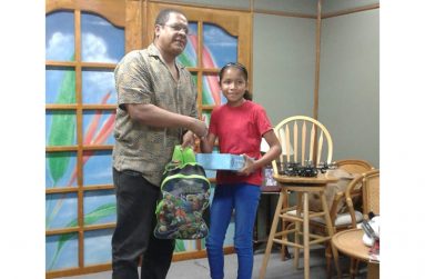 Anasie Federicks receiving another gift from FFTP