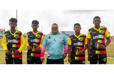 From left: Richard Ramdeholl, Shahid Ramzan, John Ramsingh of FL Sport, Usain Fredricks, and Patrice Fraser.