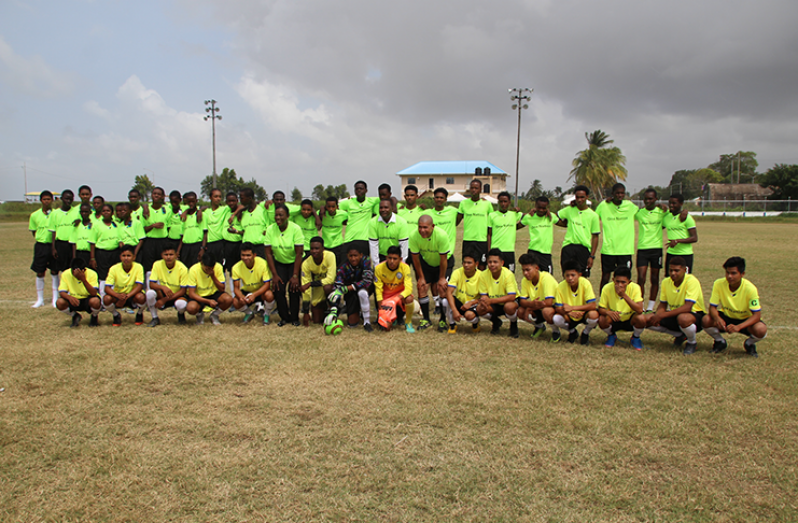 Minister of Education, Dr the Hon. Nicolette Henry, and Minister of Social Cohesion, Dr George Norton, took time out for a light moment with the team in their new football uniforms.