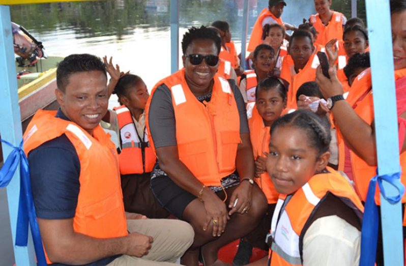 Minister within the Ministry of Communities, with responsibility for Housing, Hon. Annette Ferguson joins the students of Dora Primary School for a test ride on the new boat.
CEO, Silica Sandport Incorporated, Horace Tiwari.