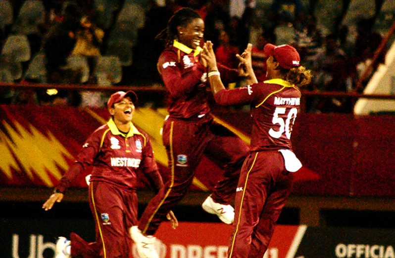 : Deandra Dottin celebrates with her teammates after completing her five-wicket haul. (Adrian Narine photos)