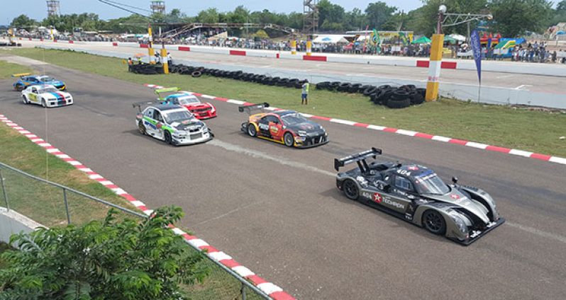 Jamaica's Kyle Greg's Radical RXC leads countryman Doug Gore's Audi (second), Kristian Jeffrey's Evolution (third) and Mark Maloney's Mazda Rx3. At the back are Jamaican Chris Campbell (BMW M5) and Trinidad’s Franklyn Boodram's Renault Megane. (Stephan Sookram photo)