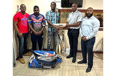 (from left) Kevin Douglas (captain), Travis Mohammed Coach), Leroy Phillips (GBCA), Shawn Massiah (GCB) and, Anthony D’Andrade