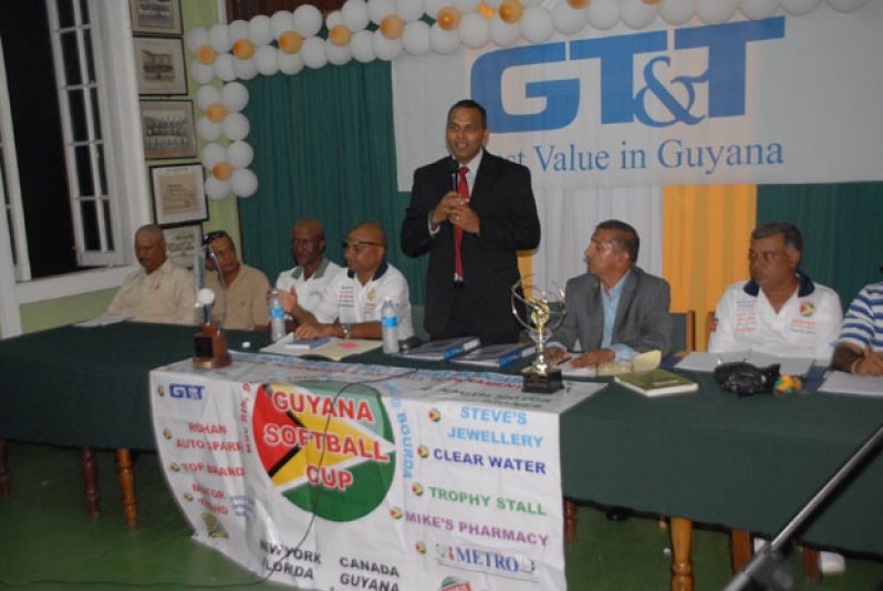 Chronicle Sport photographer Sonell Nelson was present at the Georgetown Cricket Club pavilion last night, to witness Minister of Sport, Dr. Frank Anthony (standing), addressing his audience at the opening ceremony of the ‘Guyana Softball Cup 111,’ while other members of the head table pay keen attention.