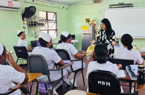Dr Misir interacting with nurses last week during her visit to the Georgetown School of Nursing
