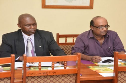 Dr Oudho Homenauth (right) and FAO Representative in Guyana, Mr. Reuben Robertson at the launch here last year of a cassava development project