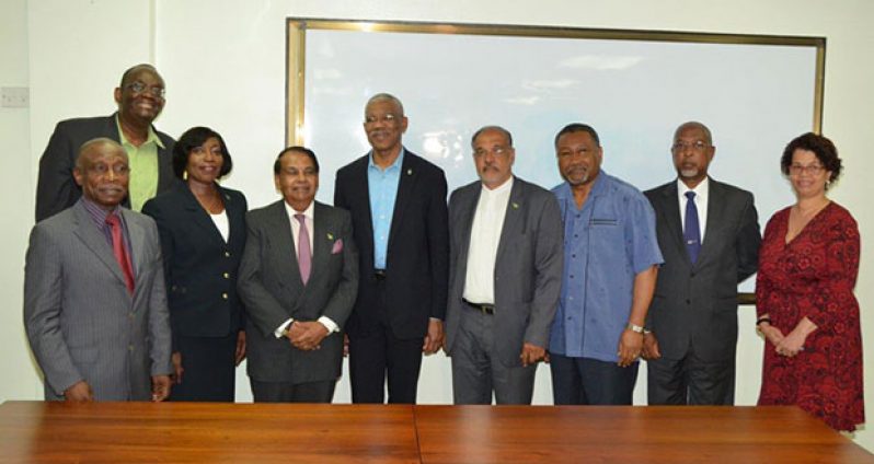 President David Granger (centre) and Vice-President and Minister of Foreign Affairs, Carl Greenidge (left), stand with Guyana's Heads of Missions at the conclusion of the orientation programme on June 25. Dr Shamir Ally stands left of President Granger (Ministry of Foreign Affairs photo)