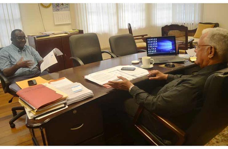 Minister Holder and Dr. Davis during their meeting