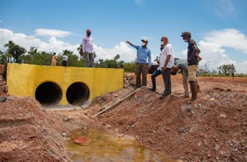 Public Works Minister, Bishop Juan Edghill inspects culverts at Haiowa, Region Nine (DPI photo)