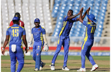 Dominic Drakes (second right) celebrating one of his four wickets against the Trinidad and Tobago Red Force. (Photo courtesy CWI Media)