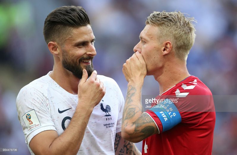 Simon Kjaer of Denmark chats with Olivier Giroud of France (left) during the 2018 FIFA World Cup Russia Group C match between Denmark and France at Luzhniki Stadium on June 26, 2018 in Moscow, Russia. (Photo by Jean Catuffe/Getty Images)