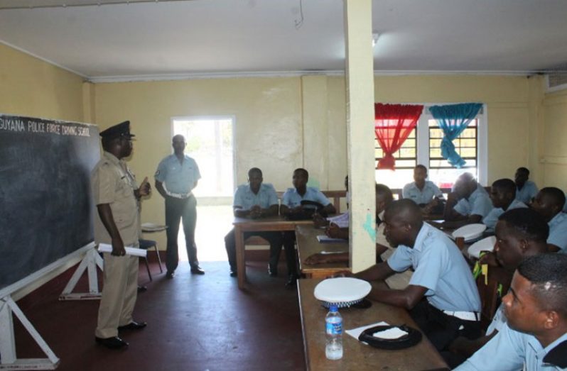 Traffic Chief, Senior Superintendent Linden Isles address ranks at the Remedial Driving Programme