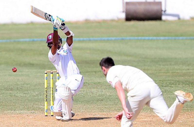 Wicketkeeper-batsman Shane Dowrich drives elegantly during his unbeaten 90 yesterday. (Photo courtesy CWI Media)