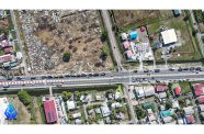 Drone shot of motor lorries along the Beterverwagting Public Road, stopped by traffic ranks for various offences