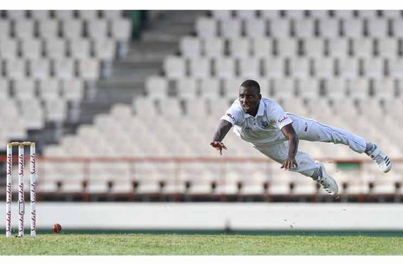 Miguel Cummins attempts a run out on the first day of the second Test between WINDIES and Sri Lanka on Thursday, June 14, 2018 at the Daren Sammy Cricket Ground. © CWI Media/Randy Brooks of Brooks Latouche Photography