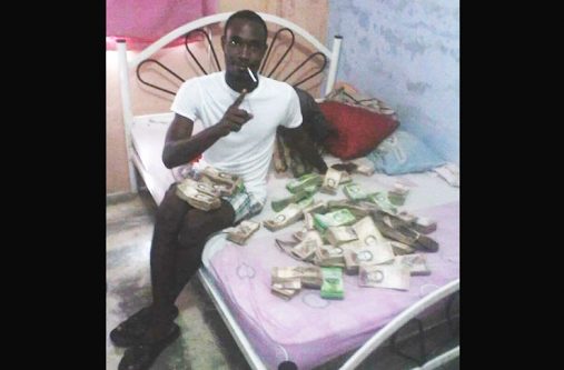 Paul Dewever posing with the cash before he was caught by the Venezuelans (Travis Chase Photo)