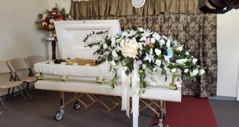 The casket that bore the body of Shondel Duke Saturday at Jerrick’s Funeral Parlour