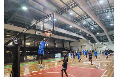 14-year-old Stephan Duke of New Central High with the Dunk