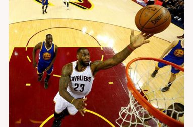 Cleveland Cavaliers forward LeBron James (23) dunks the ball in front of Golden State Warriors forward Draymond Green (23) during the fourth quarter in game three of the NBA Finals at Quicken Loans Arena. (Ken Blaze-USA TODAY photo)