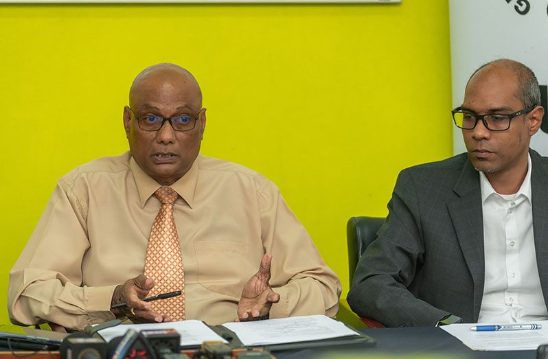 Chief Elections Officer Vishnu Persaud (left) and Deputy Chief Elections Officer, Aneal Giddings