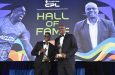 Dwayne Bravo (left) and Ian Bishop pose with their respective awards after being inducted into the CPL Hall of Fame (Photo courtesy CPL)