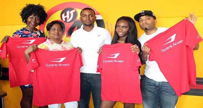 Jonathan Beaton (centre) with some of the winners of ‘all expenses paid’ trips home for Mash