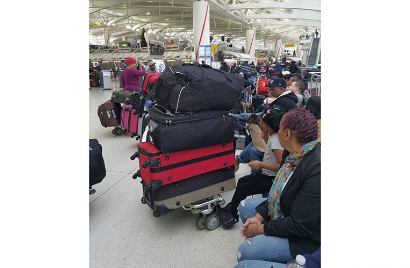 Stranded Dynamic Airways passengers were awaiting word on their flight at JFK on Saturday (Photo compliments of Mark Benschop)