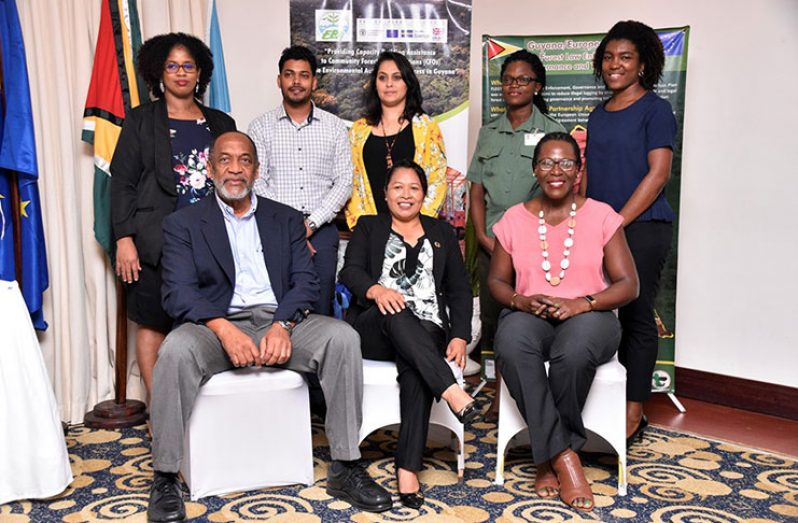 Minister of State Dawn Hastings-Williams (seated in the centre), Head of the EPA, Dr. Vincent Adams and Director of the Department of Environment, Ndibi Schwiers. Standing behind them are participants of the capacity building workshop