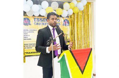 Minister Charles Ramson speaking at the award ceremony