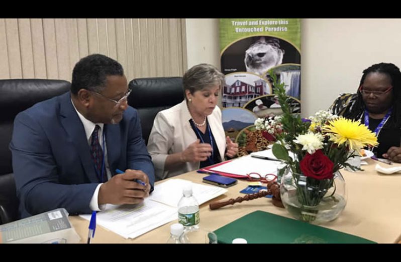 Guyana’s Permanent Representative to the UN, Ambassador Michael Ten-Pow (left), ECLAC’s Alicia Bárcena and another official during the meeting