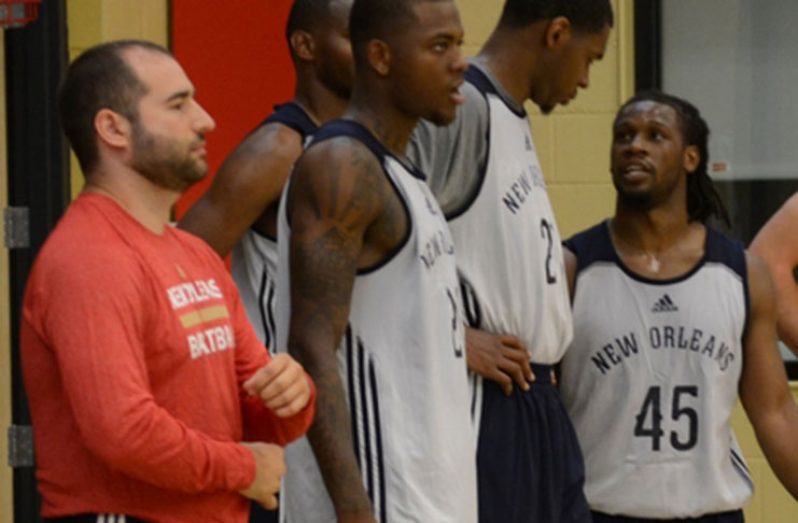 (first from left) New Orleans Pelicans assistant coach for Player Development
