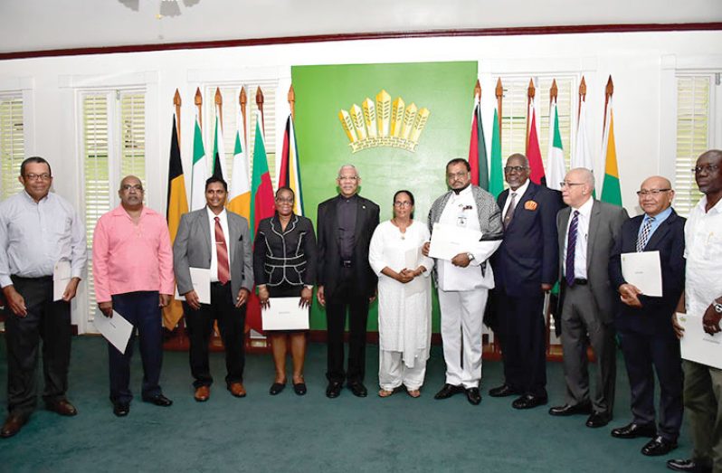 President David Granger flanked by the newly-appointed members of the Ethnic Relations Commission (ERC)