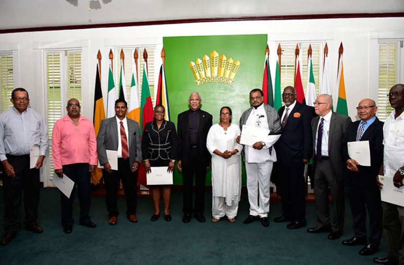 President David Granger flanked by the newly-appointed members of the Ethnic Relations Commission (ERC)