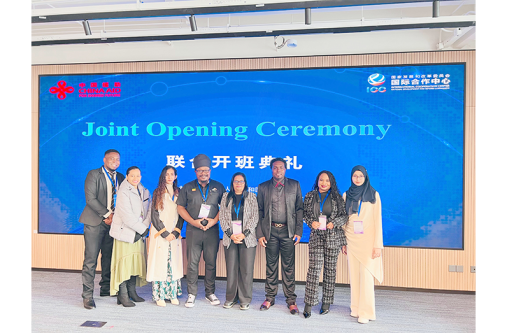 ERC Commissioners Mr Deon Dick (Ras Khafra) and Mrs Chandrowtie Sarran  and secretarial staff in China (ERC photo)