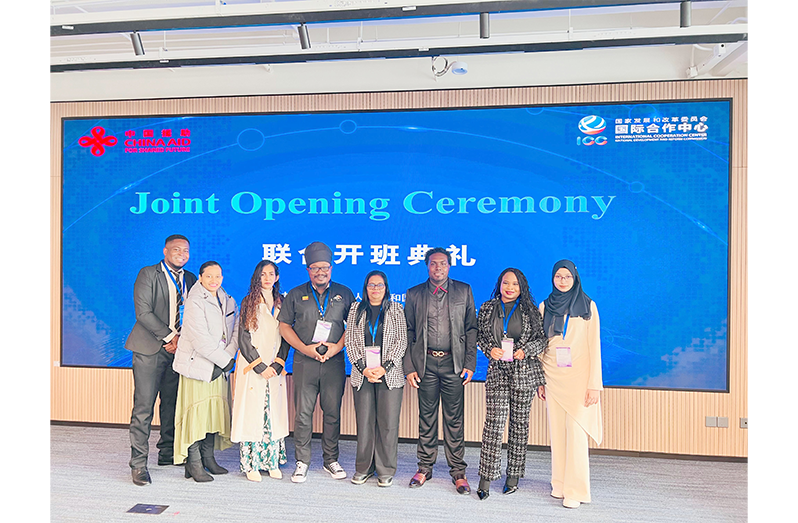 ERC Commissioners Mr Deon Dick (Ras Khafra) and Mrs Chandrowtie Sarran  and secretarial staff in China (ERC photo)